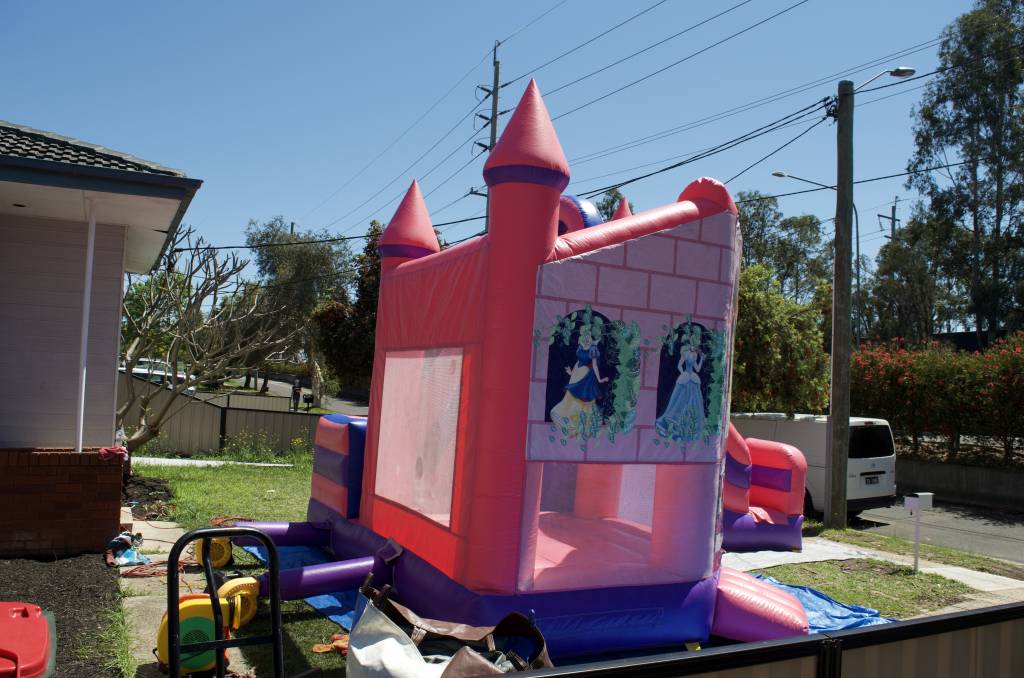 Back and side of Disney Princess jumping castle