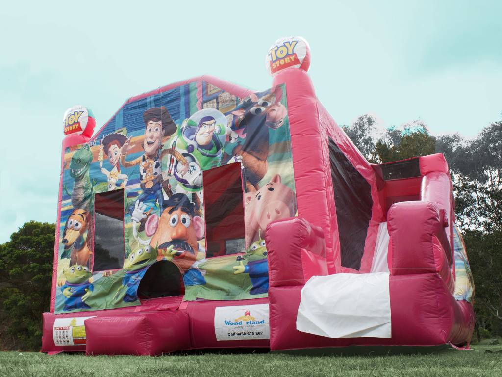 Pink Toy Story jumping castle with slide