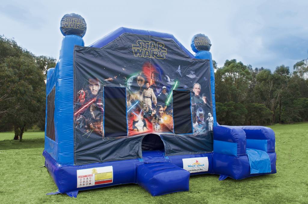 Blue Star Wars jumping castle with slide