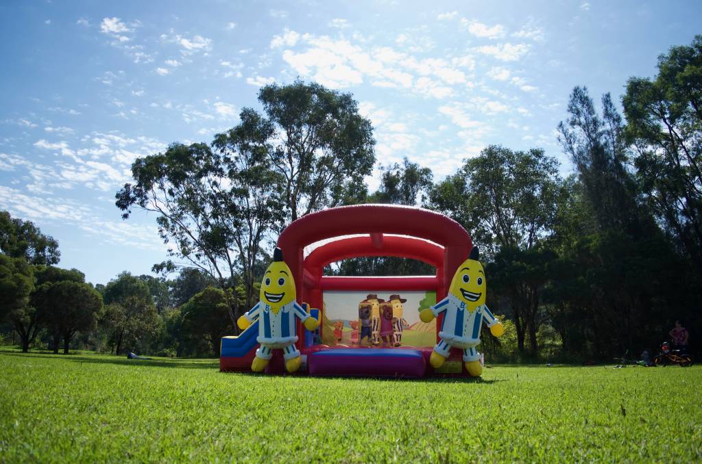 Bananas in Pyjamas jumping castle with slide
