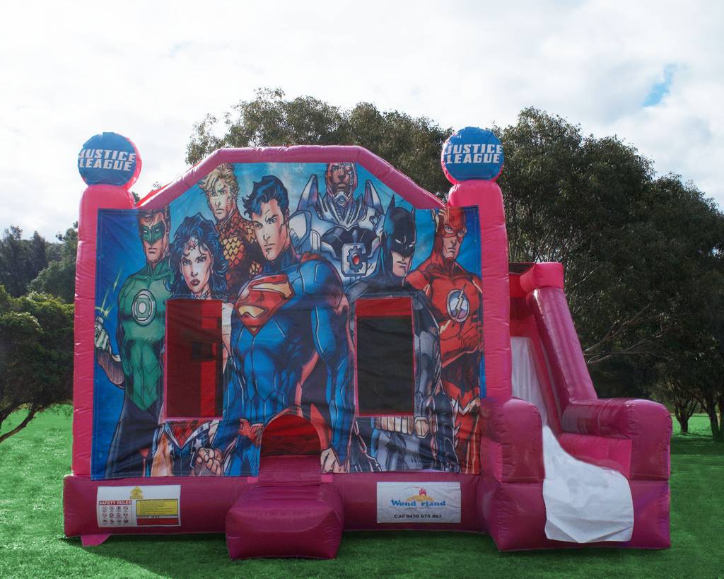 Pink Justice League jumping castle with slide