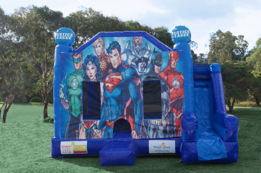 Blue Justice League jumping castle with slide