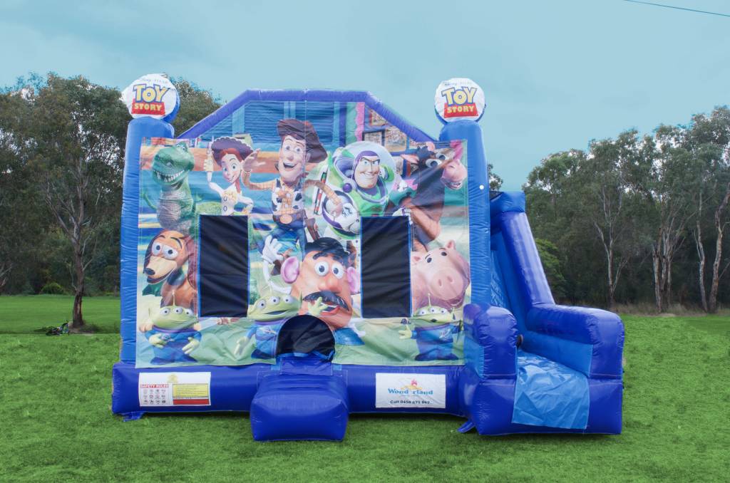 Blue Toy Story jumping castle with slide