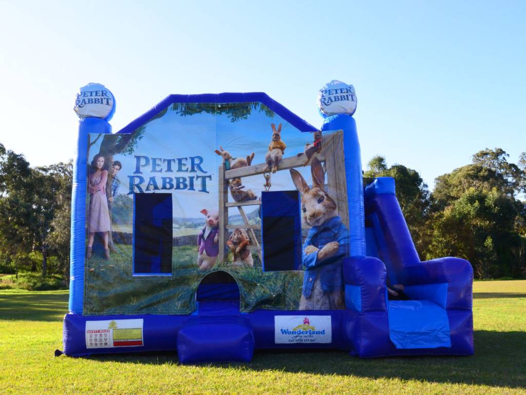 Blue Peter Rabbit jumping castle with slide