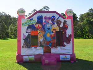 Pink Sesame Steet jumping castle with no slide